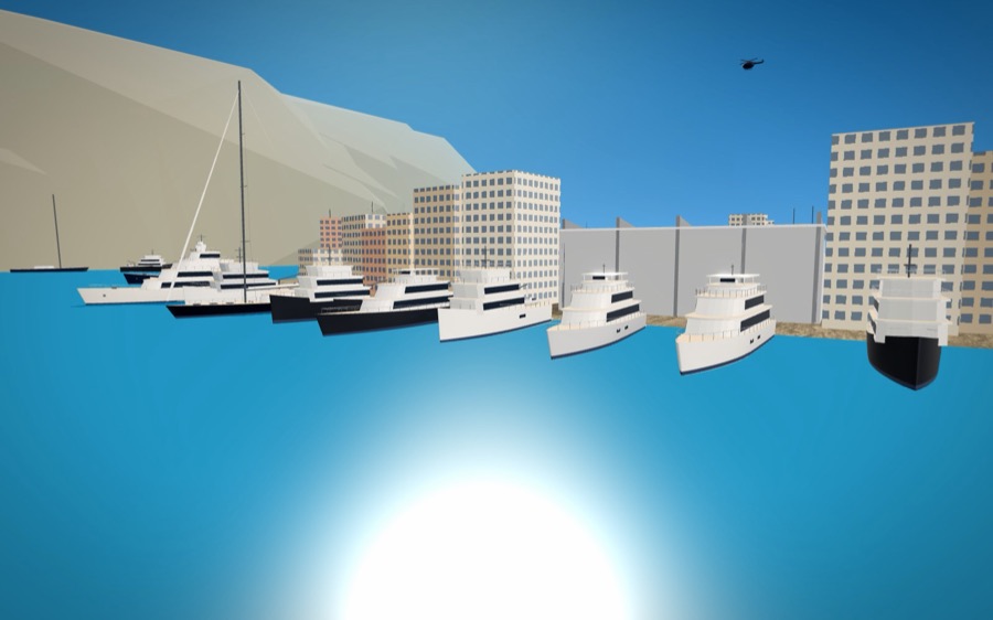 Superyachts and sailing yachts moored stern-to along the harbour at Monaco