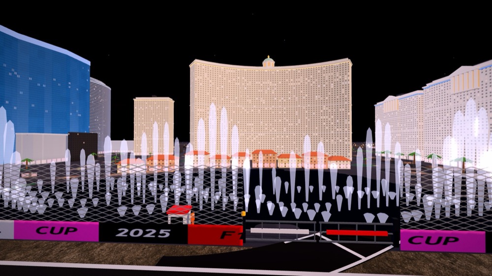 The Bellagio's curved tower behind its lake, rows of fountain jets rising in front of it at night