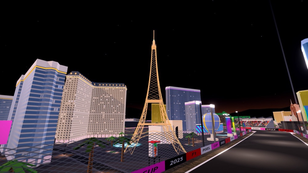 The half-scale Eiffel Tower lit gold beside the circuit, a striped hot-air balloon at its foot