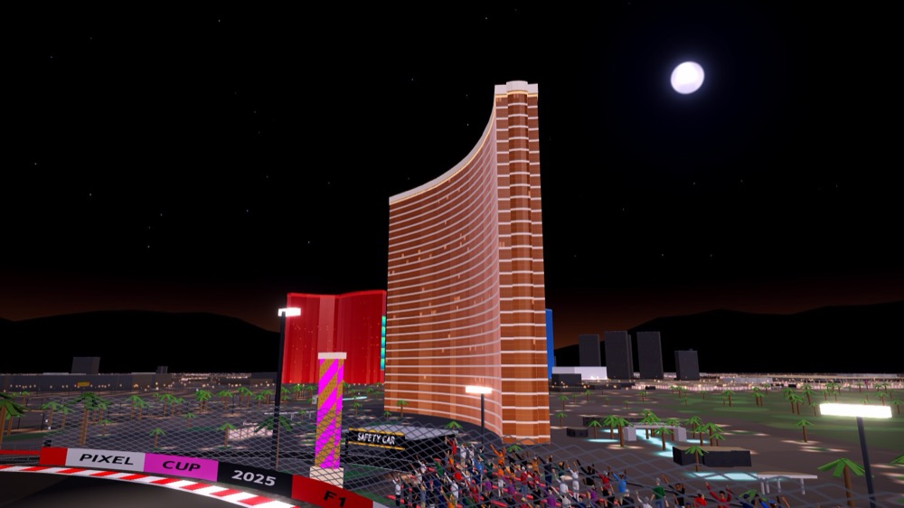 The Wynn's curved bronze glass tower under a full moon and stars